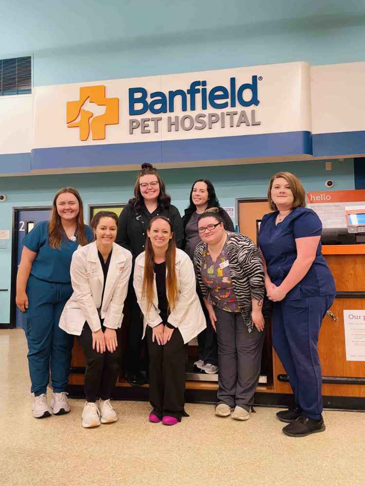 The staff posing inside the Covington hospital